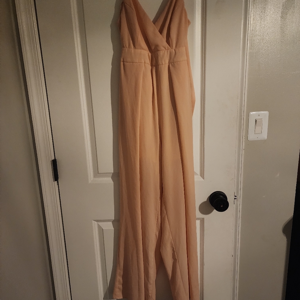Nanamac jumpsuit size small. Never worn.